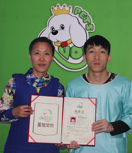 圣寵學(xué)員韓建生與金春梅老師合影